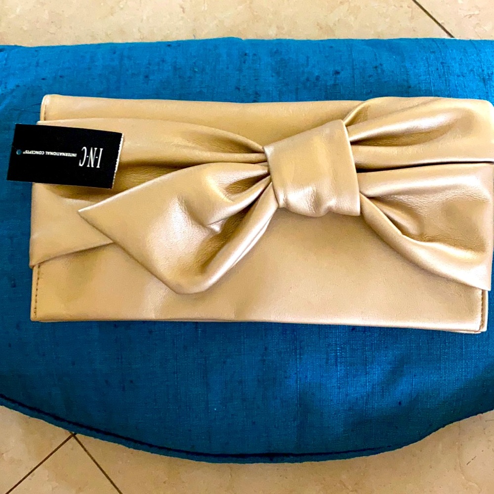 NWT GOLD Clutch or shoulder bag.